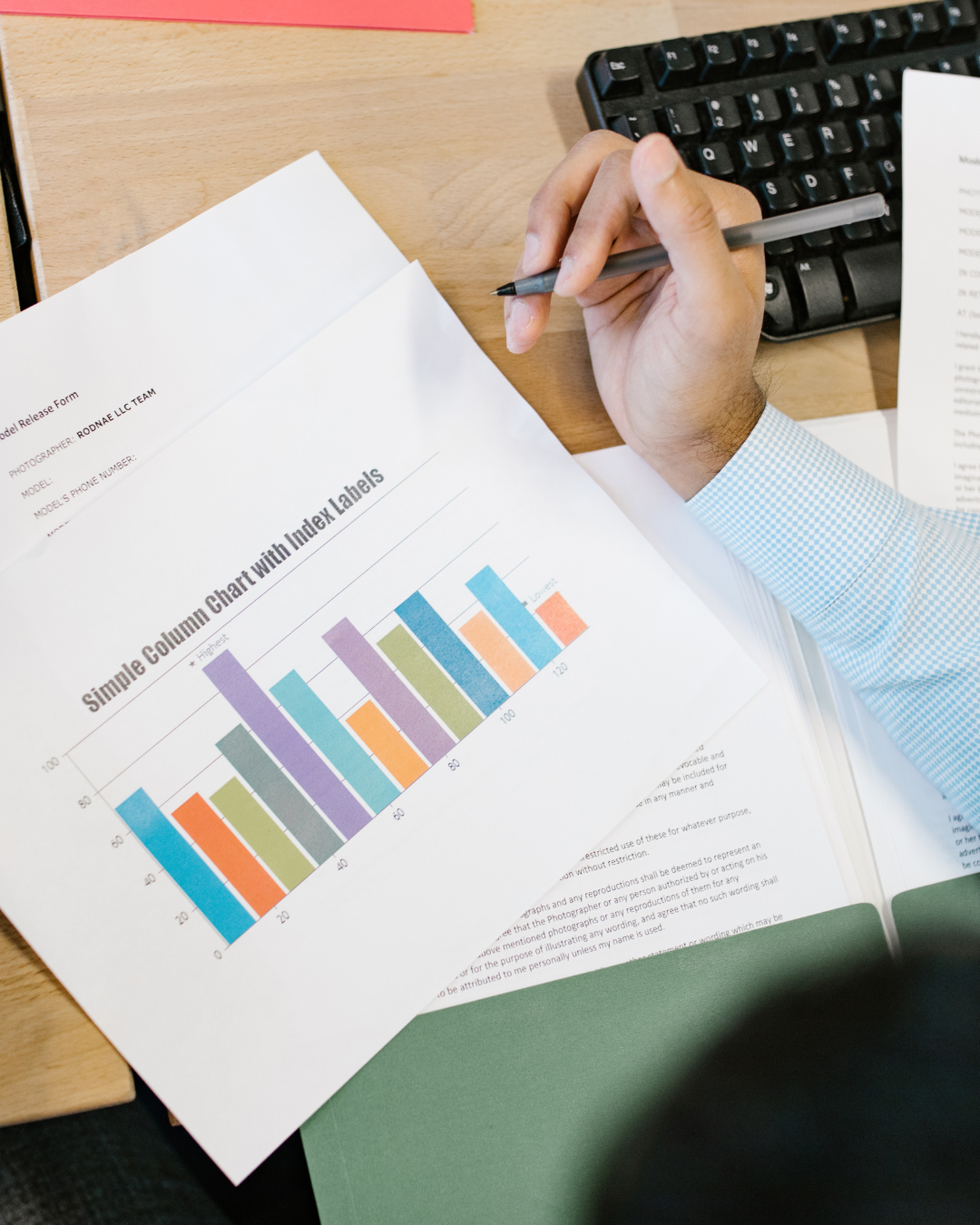 Reviewing market research data charts and analytical reports